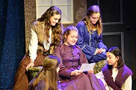 Close up of young women acting in a period peice. Part of CenterStage Theatre Company.